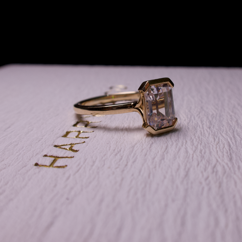  half bezel diamond engagement ring 