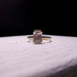 half bezel emerald diamond ring 