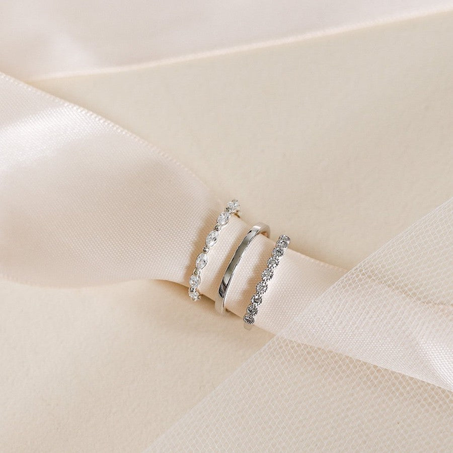 marquise shape diamond ring, plain white gold wedding ring, diamond wedding ring with millgrain edges