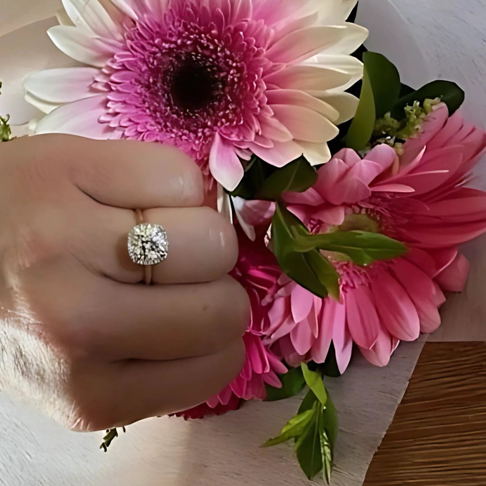 Custom cushion cut diamond engagement ring with halo setting designed by Harry & Co Adelaide
