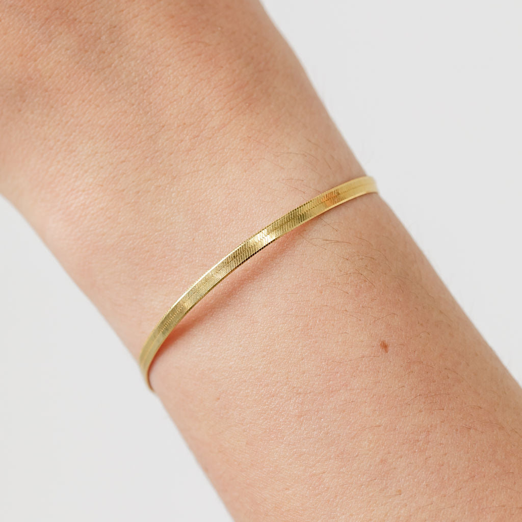 gold herringbone bracelet