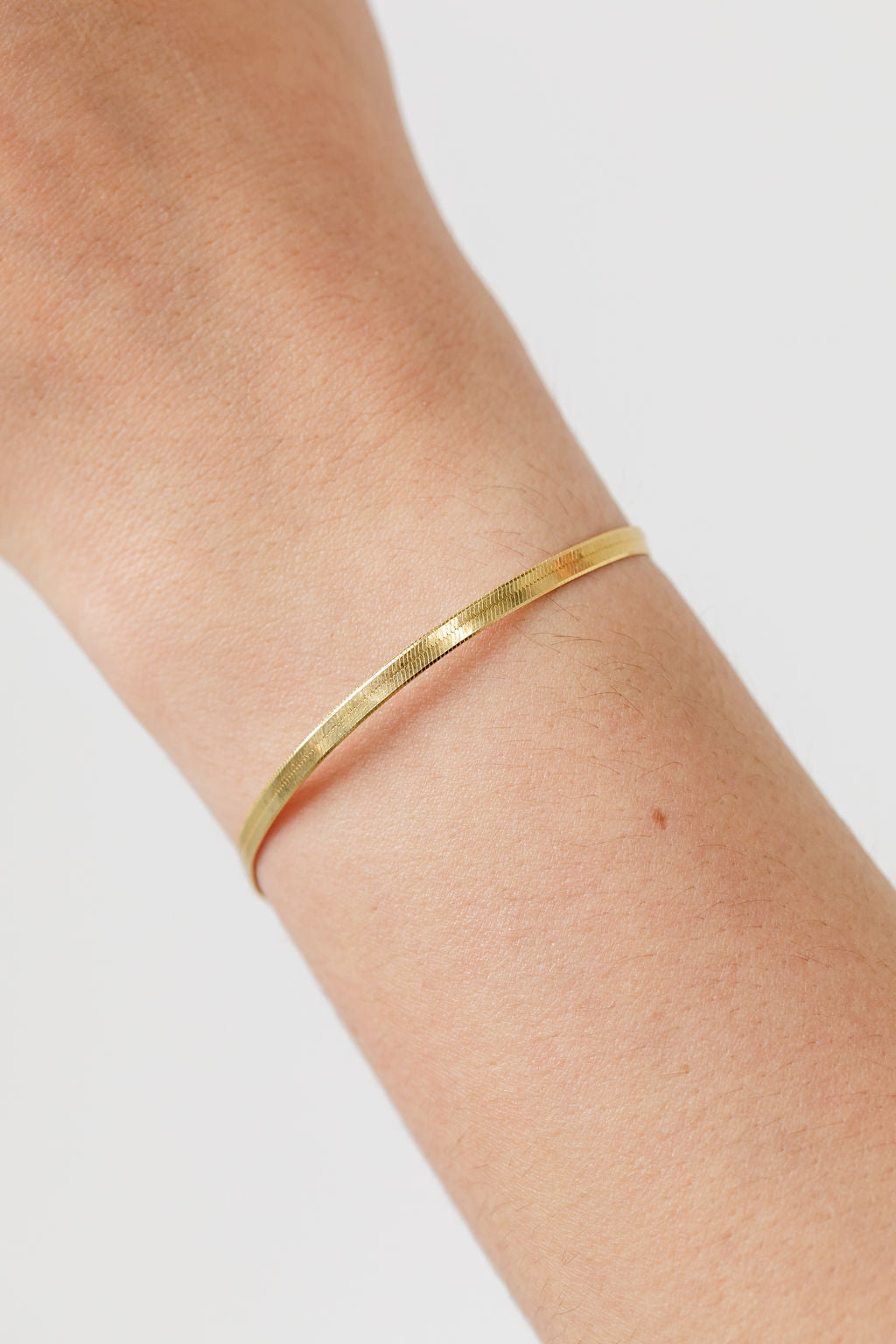 gold herringbone bracelet