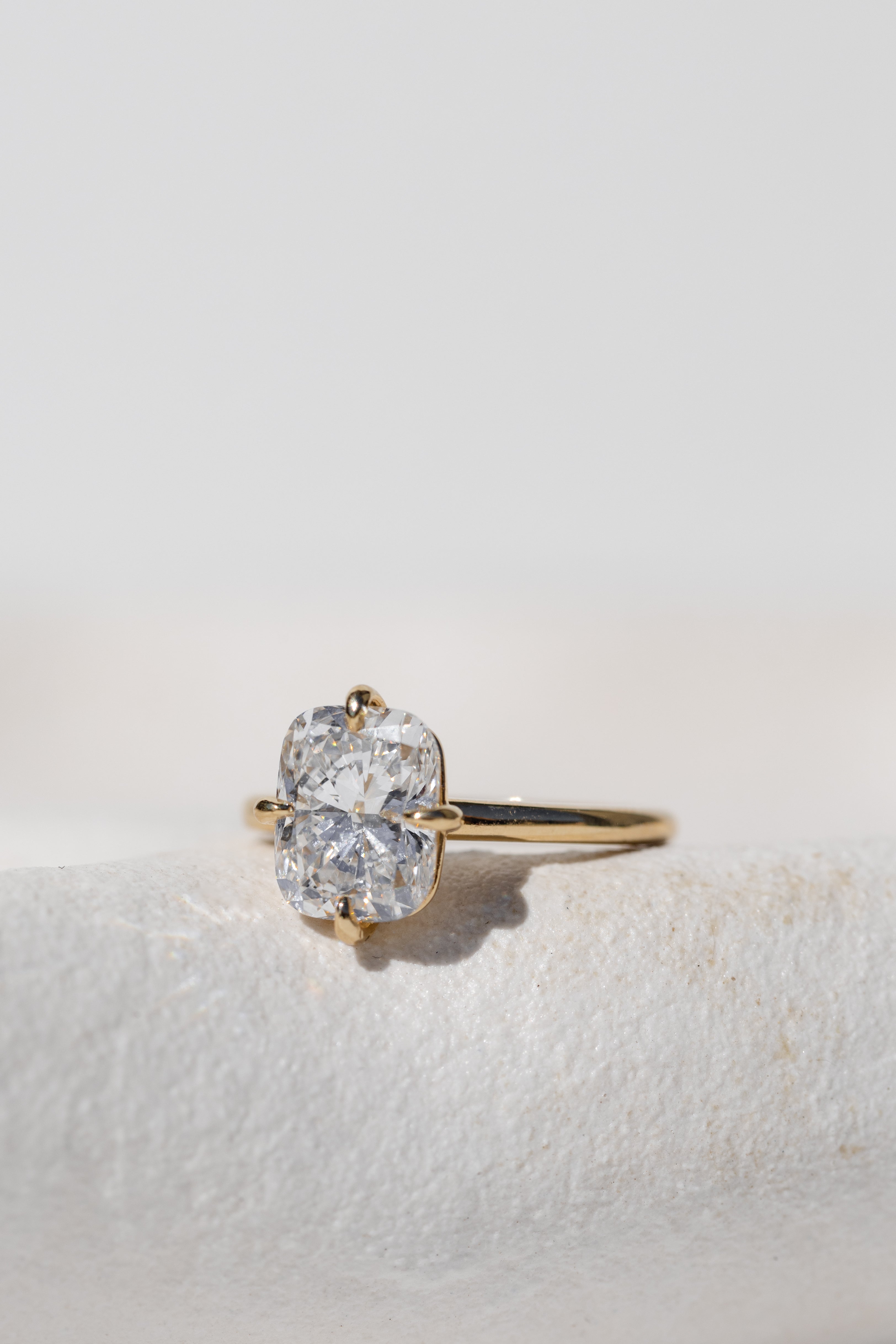 Elongated Cushion Cut Solitaire Engagement Ring Compass Setting