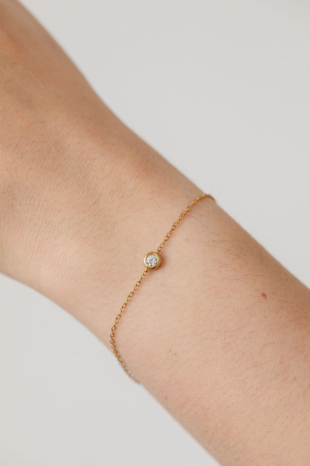 Diamond bezel gold bracelet