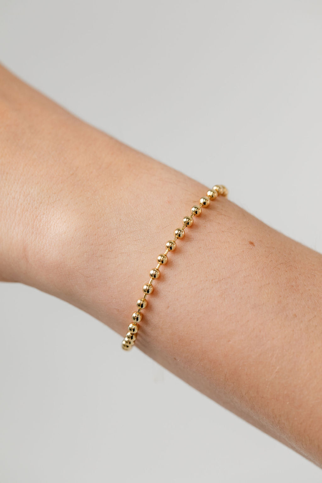 Mini gold ball bracelet