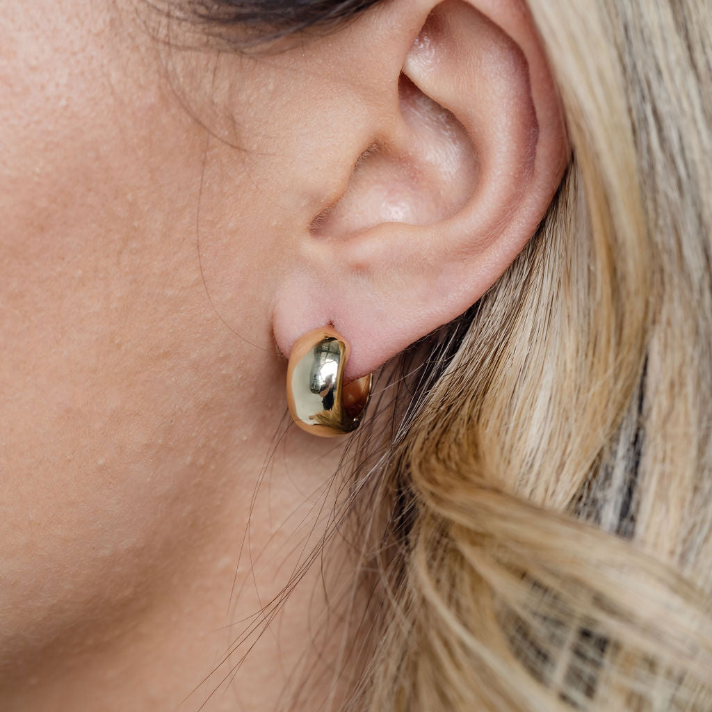 Wide Gold Huggie Earrings
