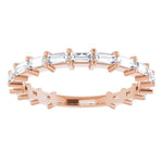 rose gold diamond wedding ring with baguette diamonds