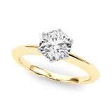 knife edge engagement ring in gold with white metal claws