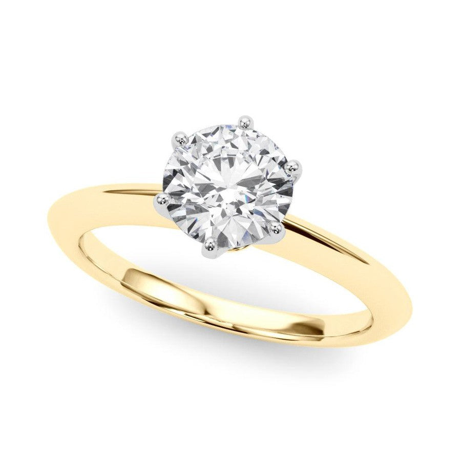 knife edge engagement ring in gold with white metal claws