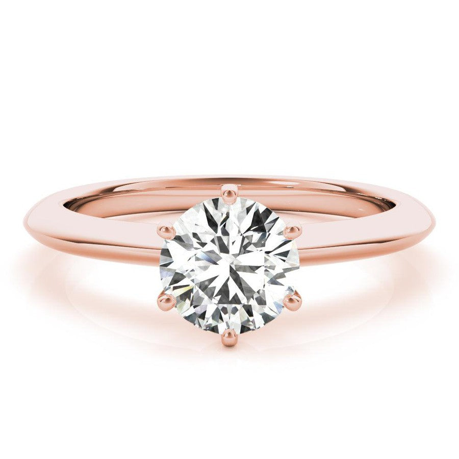 Knife edge engagement ring in rose gold