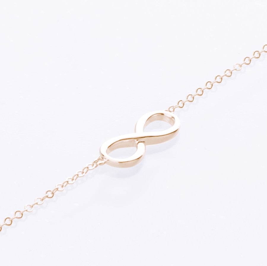 yellow gold infinity bracelet