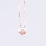 rose gold disc pendant with engraved letter