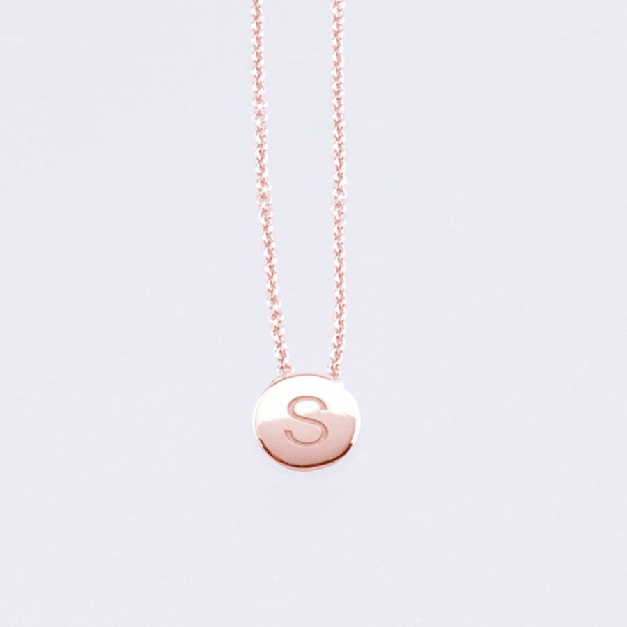 rose gold disc pendant with engraved letter