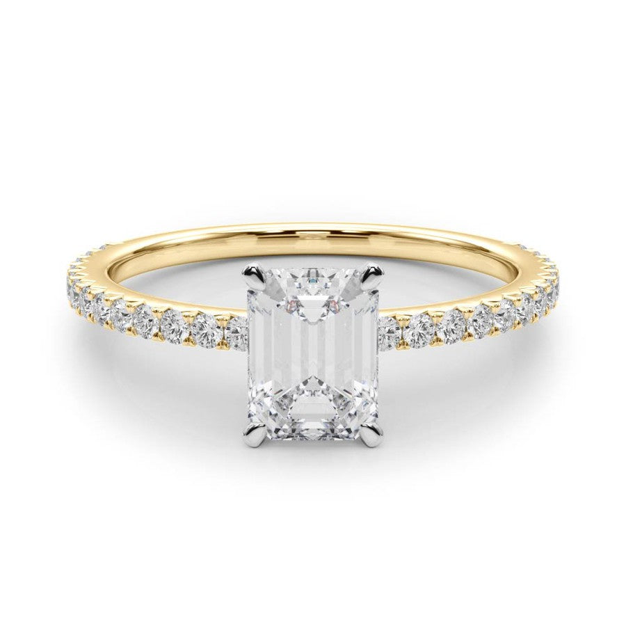 yellow gold emerald cut moissanite on a fine moissanite band