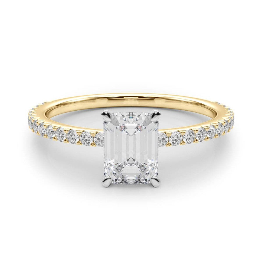 yellow gold emerald cut moissanite on a fine moissanite band