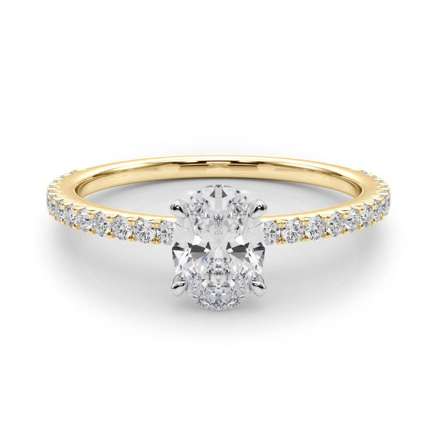 yellow gold oval shape moissanite engagement ring with fine moissanite band