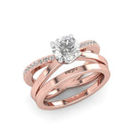 Rose Gold round moissanite engagement ring with flat cigar style criss cross band