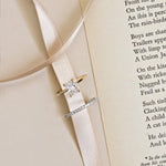 white gold diamond wedding ring and yellow gold radiant cut solitaire diamond engagement ring