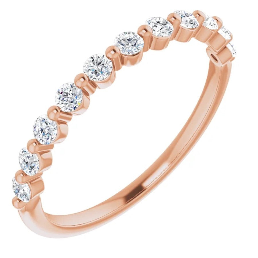 rose gold diamond wedding ring with single claws and round diamonds