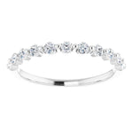 white gold diamond wedding ring with single claws and round diamonds
