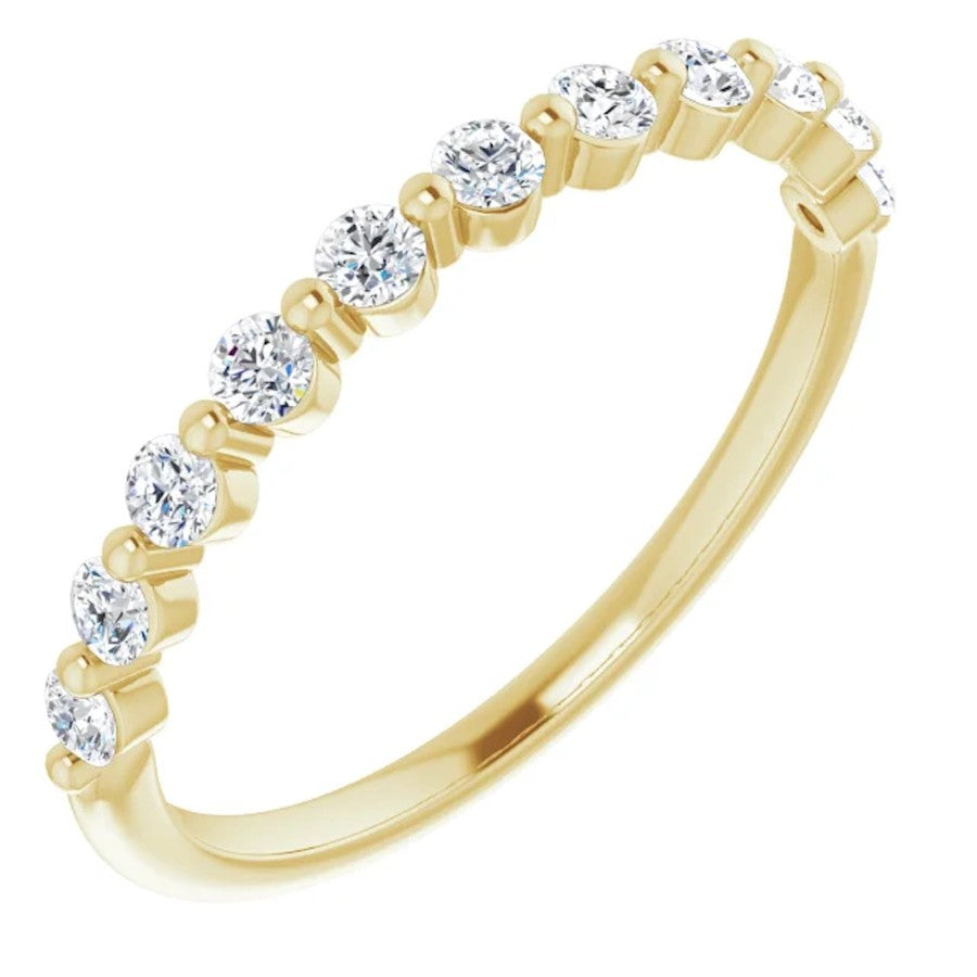 yellow gold diamond eternity ring with single claws and round diamonds