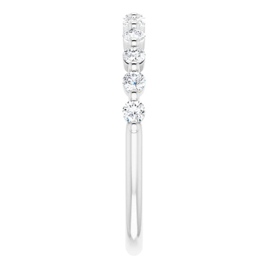 white gold diamond wedding ring with single claws and round diamonds