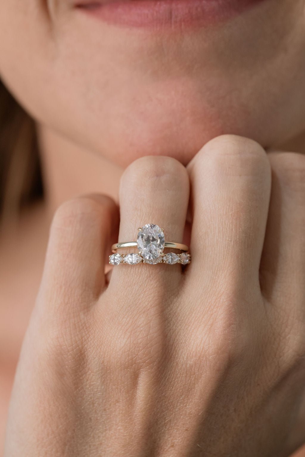 oval diamond solitaire engagement ring with marquise diamond wedding ring