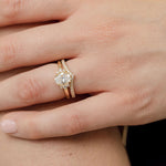 oval engagement ring with v shape diamond wedding ring