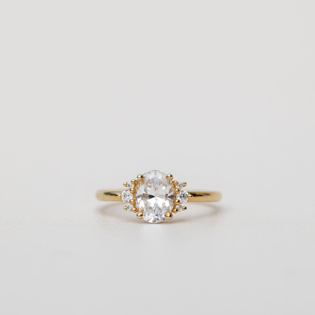 oval cut diamond engagement ring with side stones