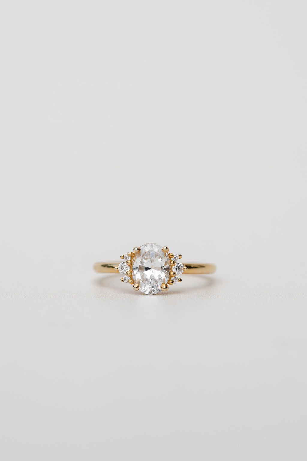 oval cut diamond engagement ring with side stones