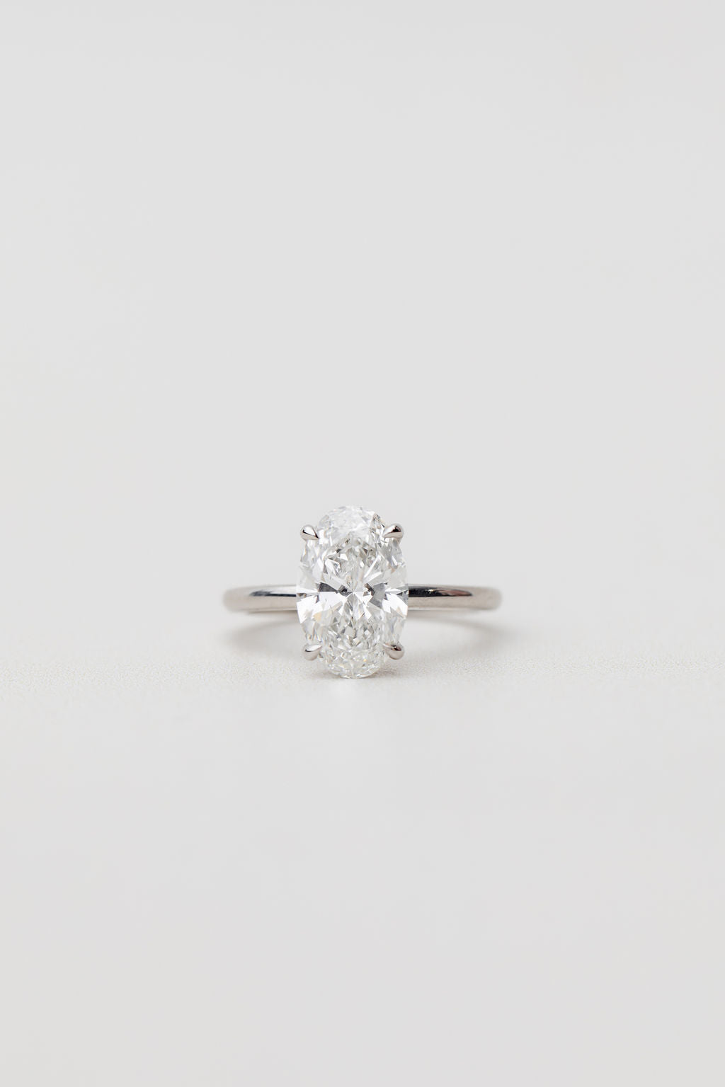 oval cut diamond solitaire engagement ring in platinum