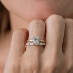 oval diamond solitaire engagement ring with marquise diamond wedding ring