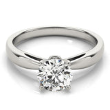 Pinch Me | Solitaire Round Brilliant Cut Engagement Ring with a tapered band