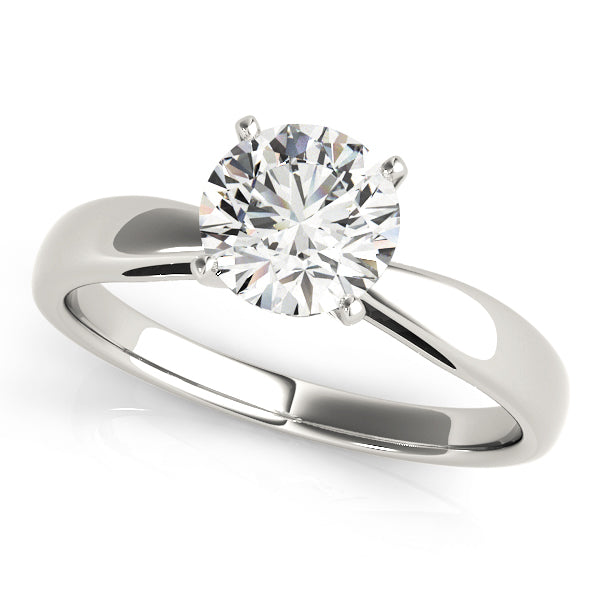 White gold pinched in solitaire with round moissanite