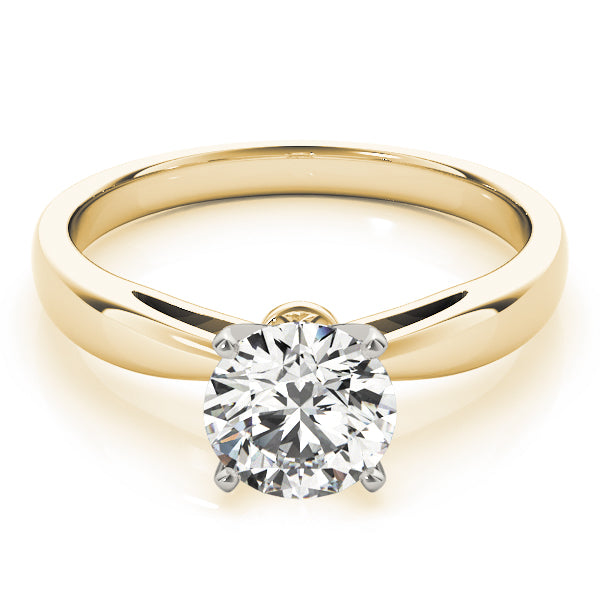 Yellow gold pinched in solitaire with round moissanite