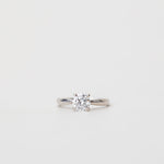 platinum solitaire engagement ring with tapered in band