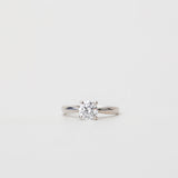 platinum solitaire engagement ring with tapered in band