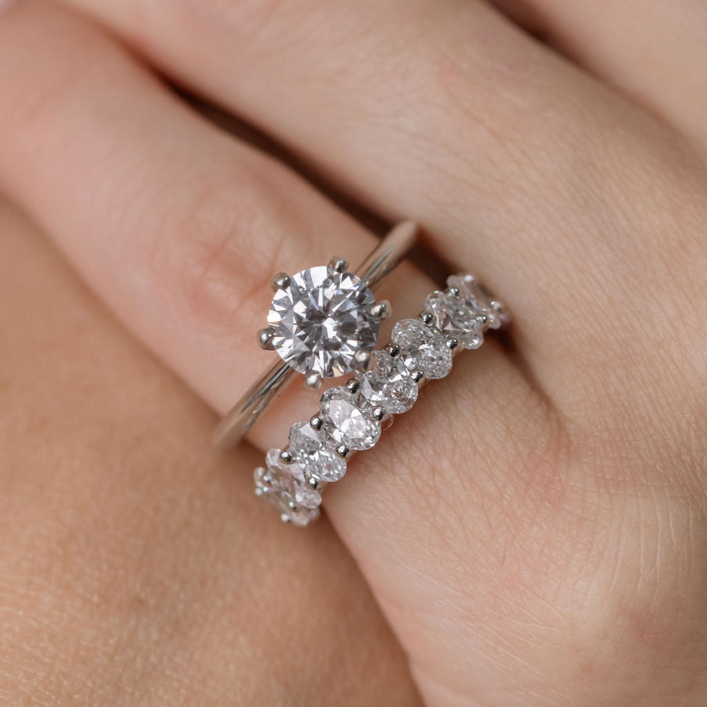 knife edge engagement ring with statement oval diamond wedding ring