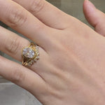 Bezel set oval diamond engagement ring with v shape diamond wedding ring