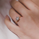 EMERALD CUT THREE STONE TRILOGY ENGAGEMENT RING