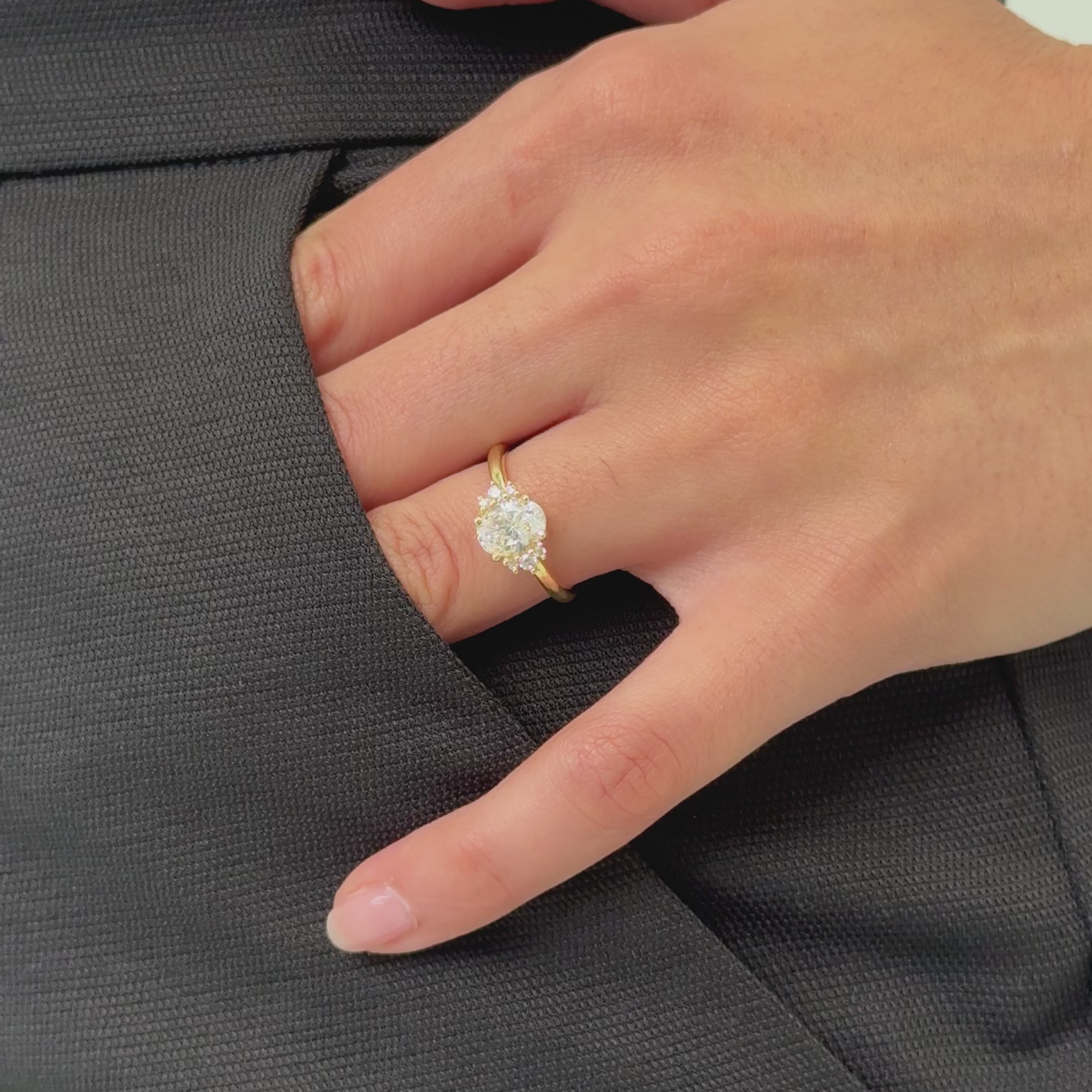 oval engagement ring with a graduated diamond halo 