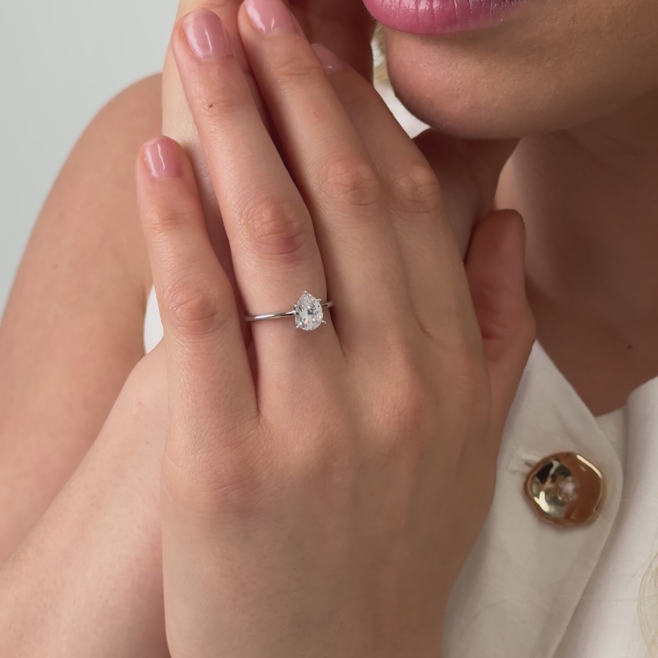 Pear cut diamond solitaire engagement ring 