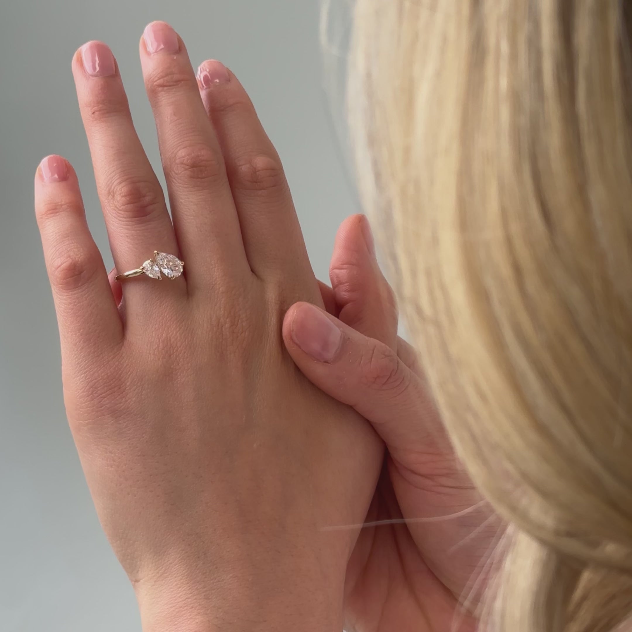 Toi et moi pear cut diamond engagement ring