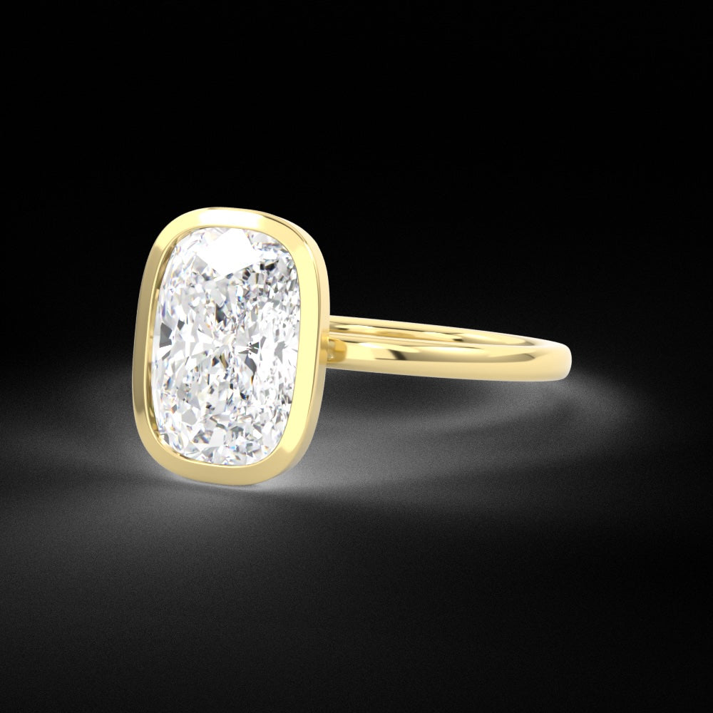 Elongated Cushion Cut diamond bezel set engagement ring 