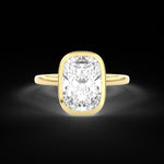 Elongated Cushion Cut diamond solitaire engagement ring, bezel set