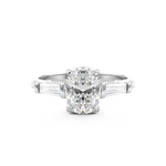 Elongated Cushion Cut 3 stone ring with tapered baguette side stones