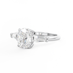 Elongated Cushion Cut 3 stone Diamond engagement ring with tapered baguette side stones in platinum