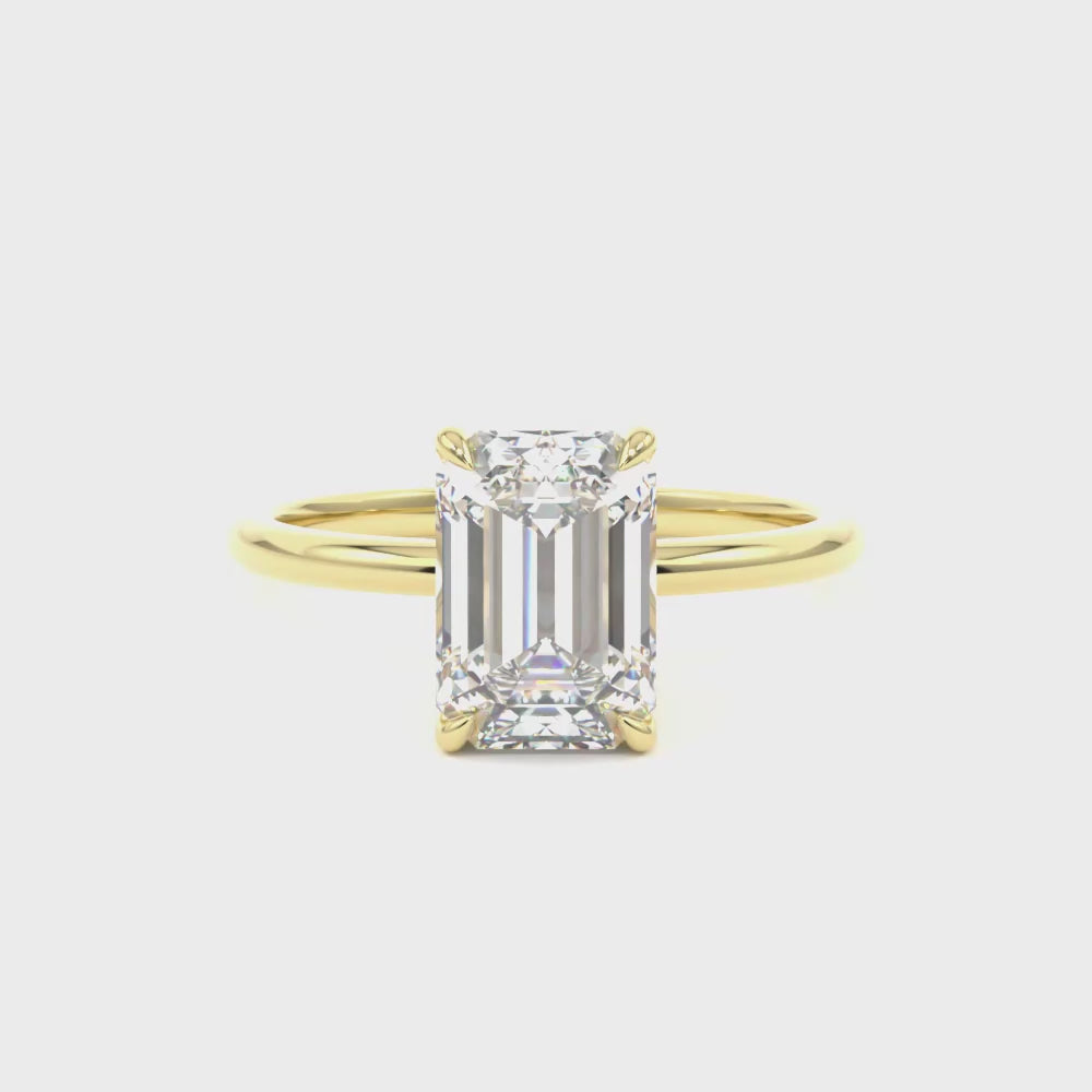 Emerald Cut Diamond Solitaire engagement ring with a hidden halo
