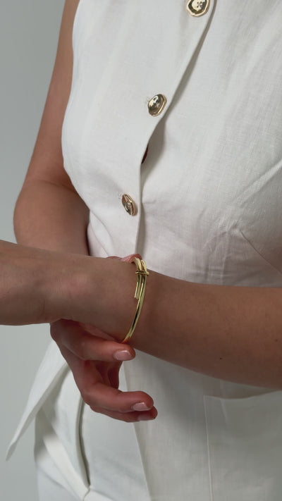 gold plated crossover bangle