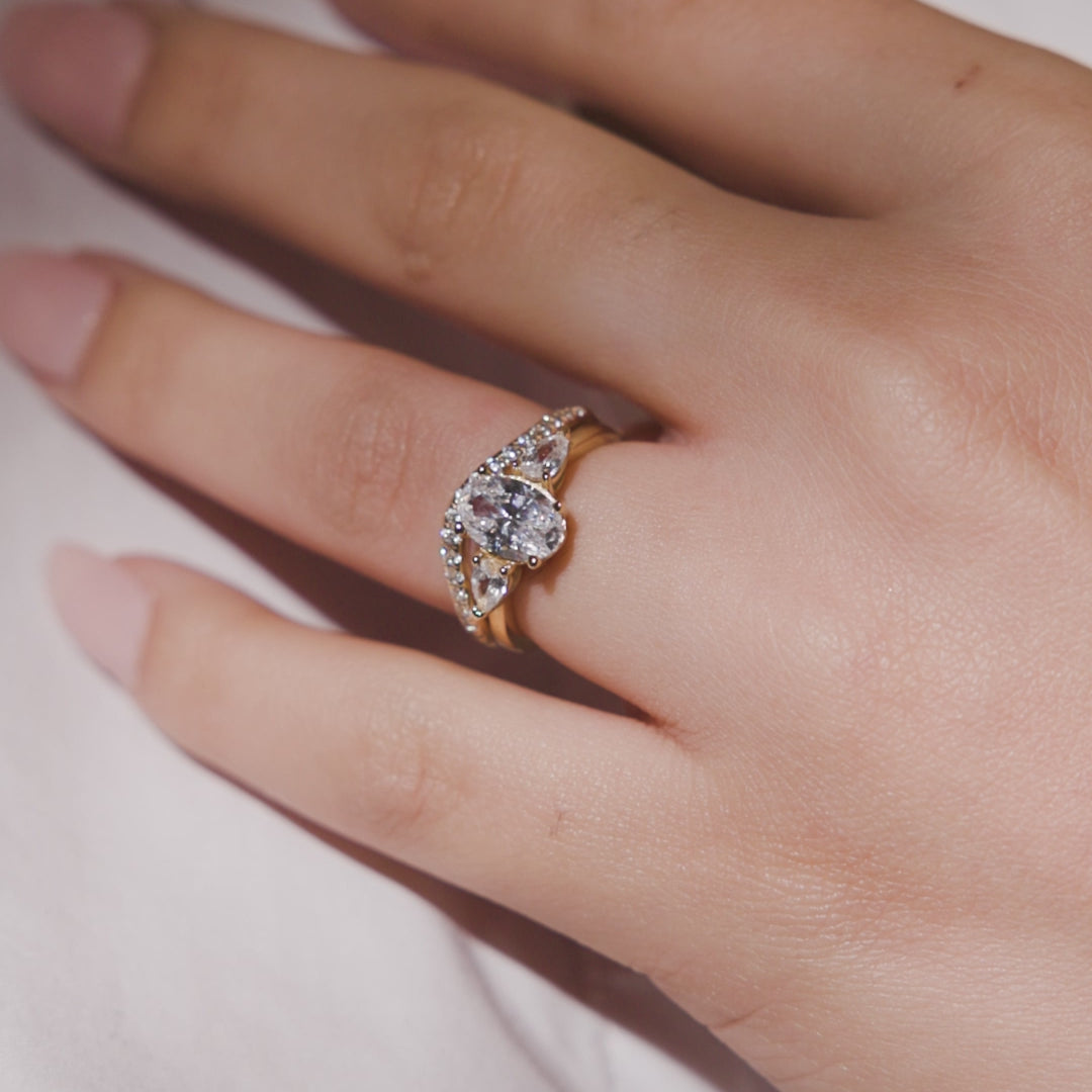 ROUND THREE STONE ENGAGEMENT RING